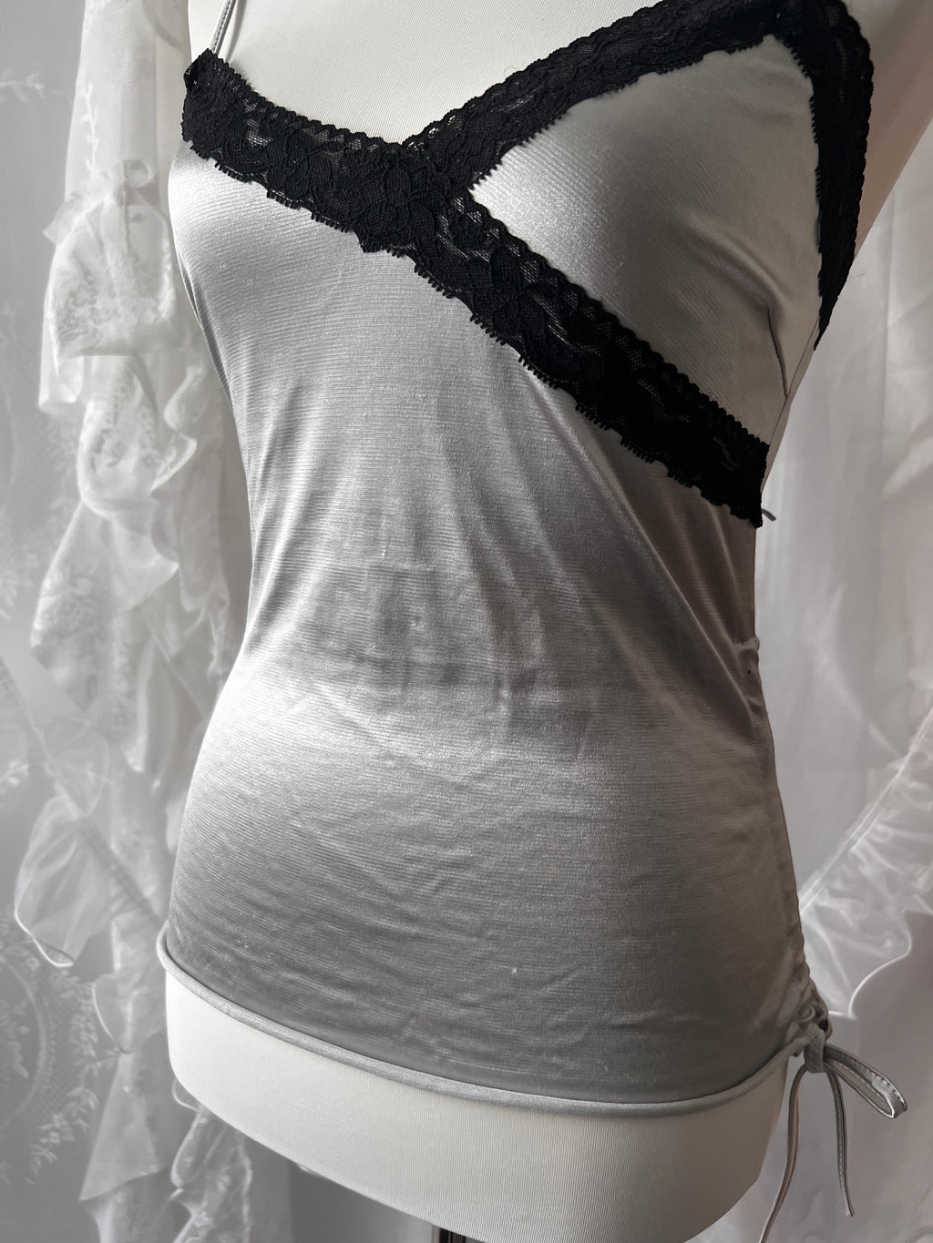 Black lace silver cami top with adjustable straps and tie detail