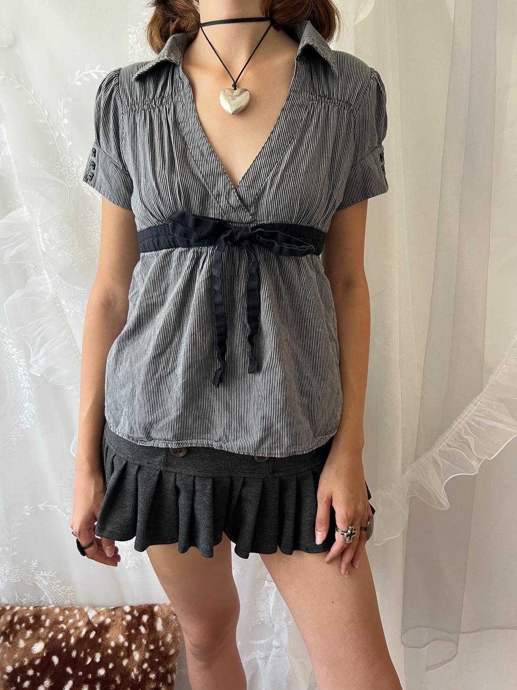 Grey pinstriped belted blouse with black ribbon tie