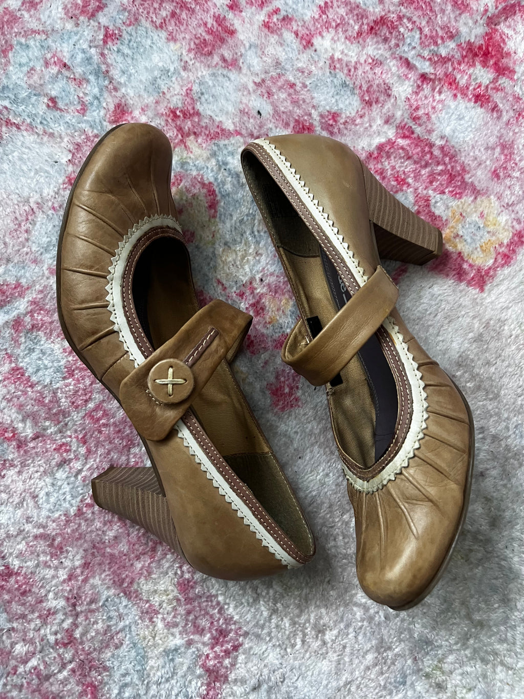 Tan Mary Jane heels with white lace trim and button detail