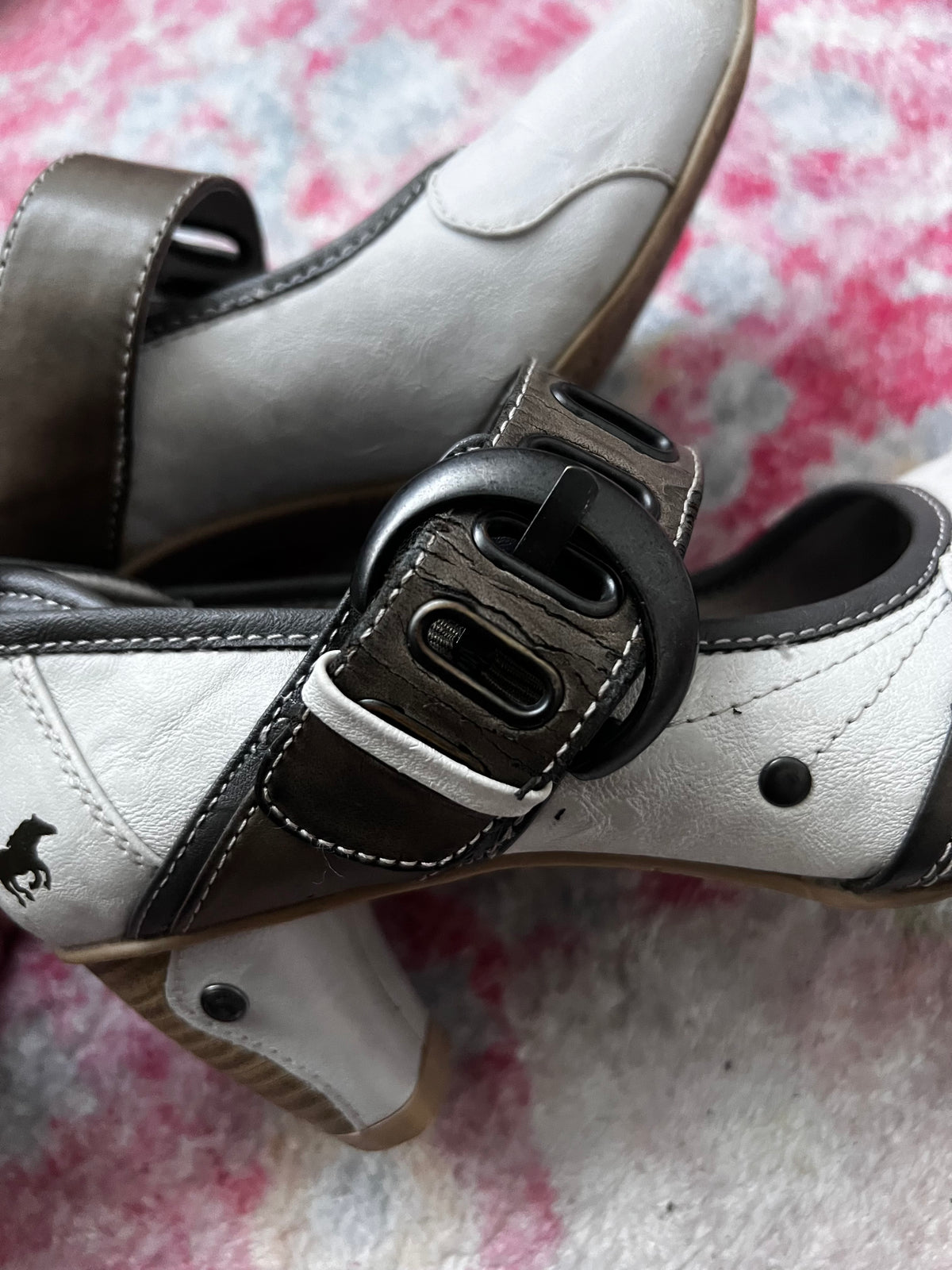 White Mustang heels with gray straps and buckles