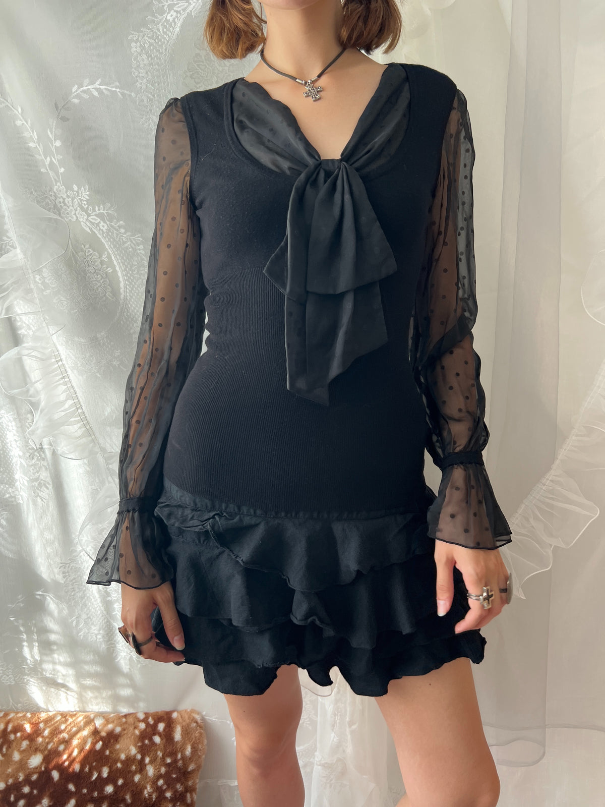 Black sheer polka dot blouse with bow detail