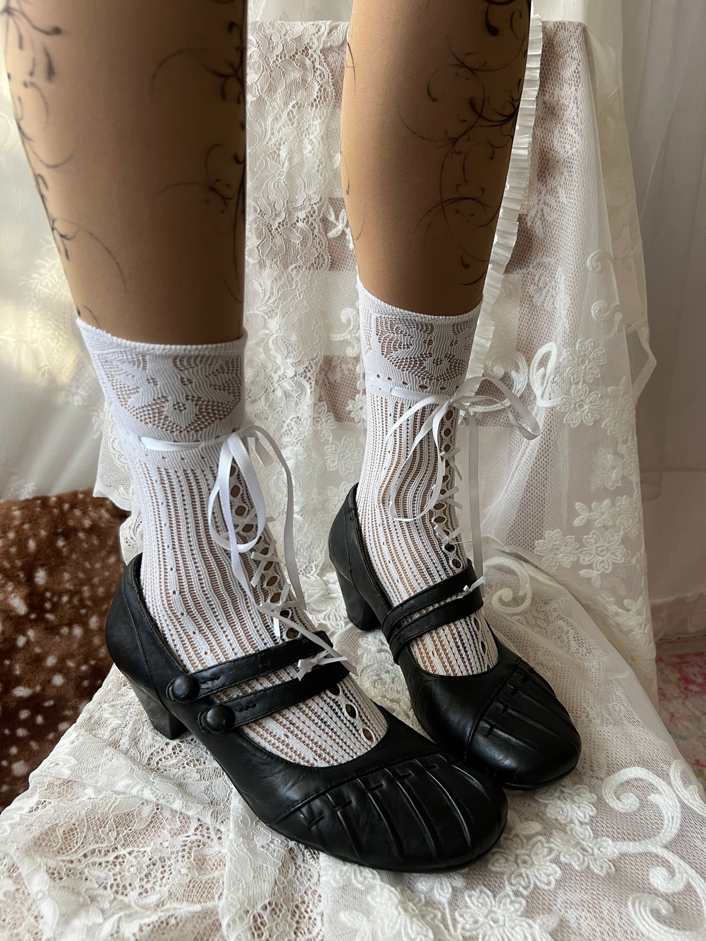 Black Mary Jane shoes with button detail