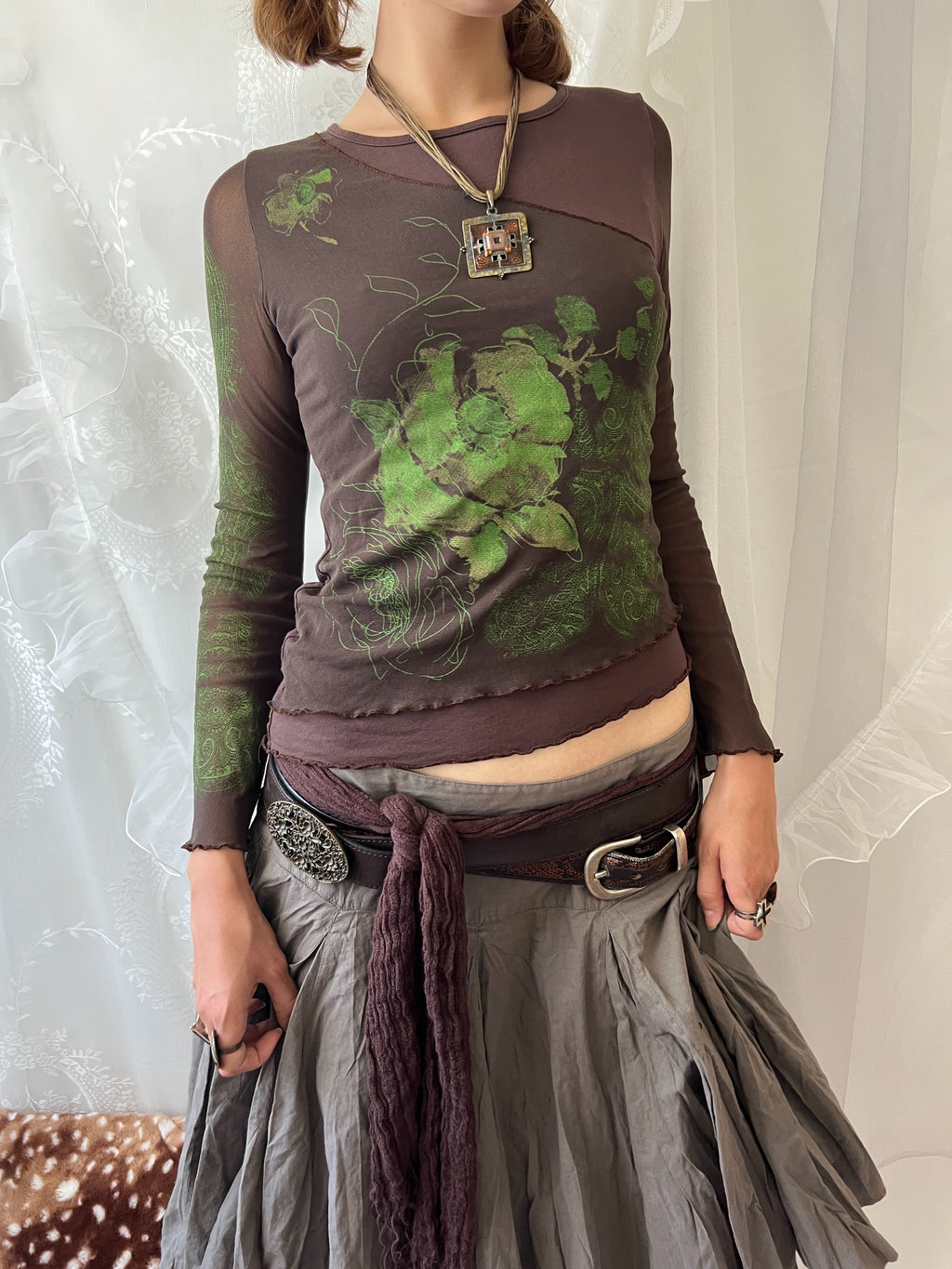 Brown sheer mesh long sleeve top with green floral design