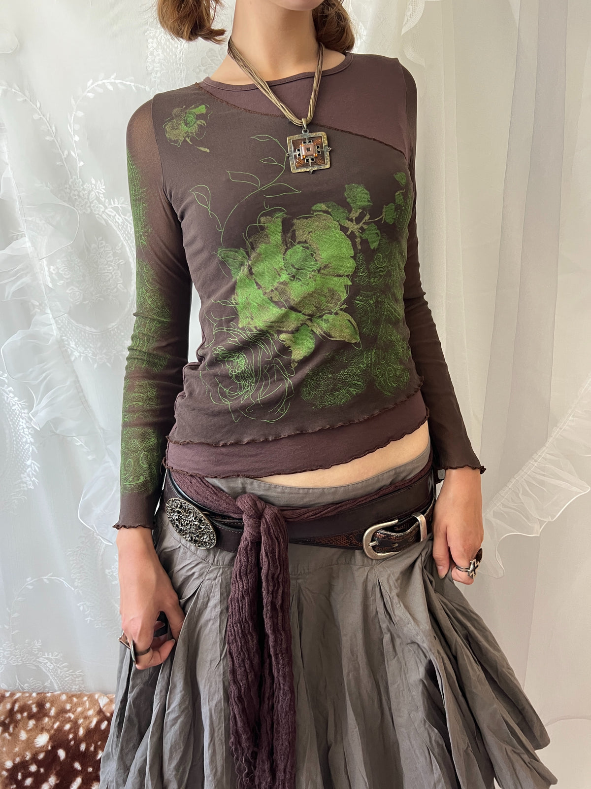 Brown sheer mesh long sleeve top with green floral design