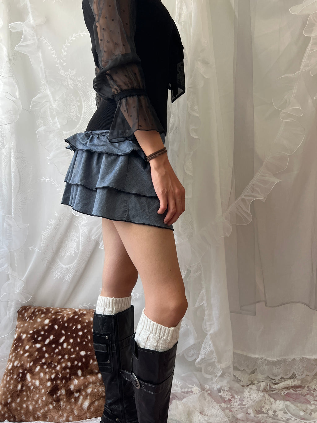 Blue ruffle layered mini skirt with buttons on both sides