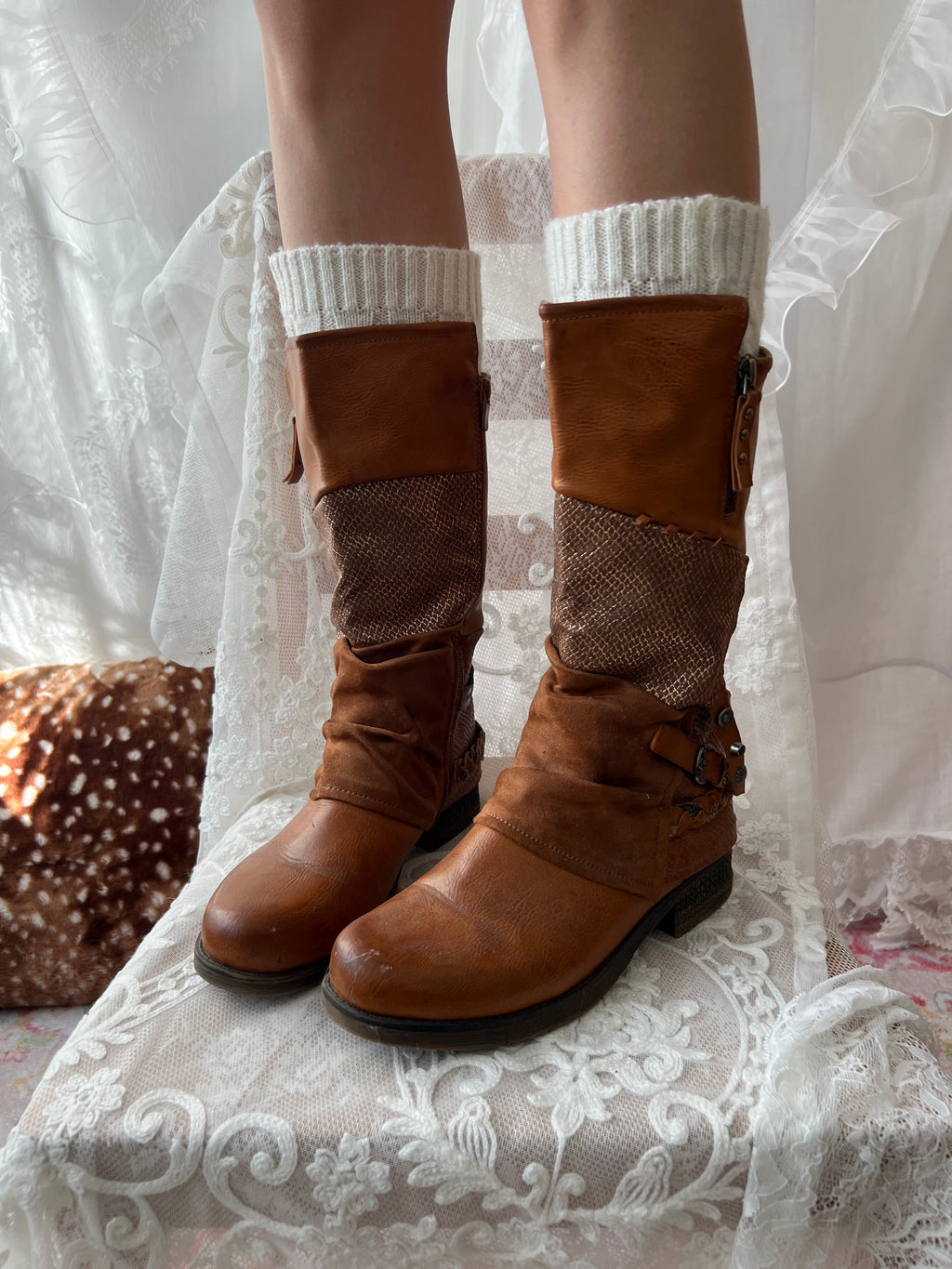Brown boots with snake skin pattern