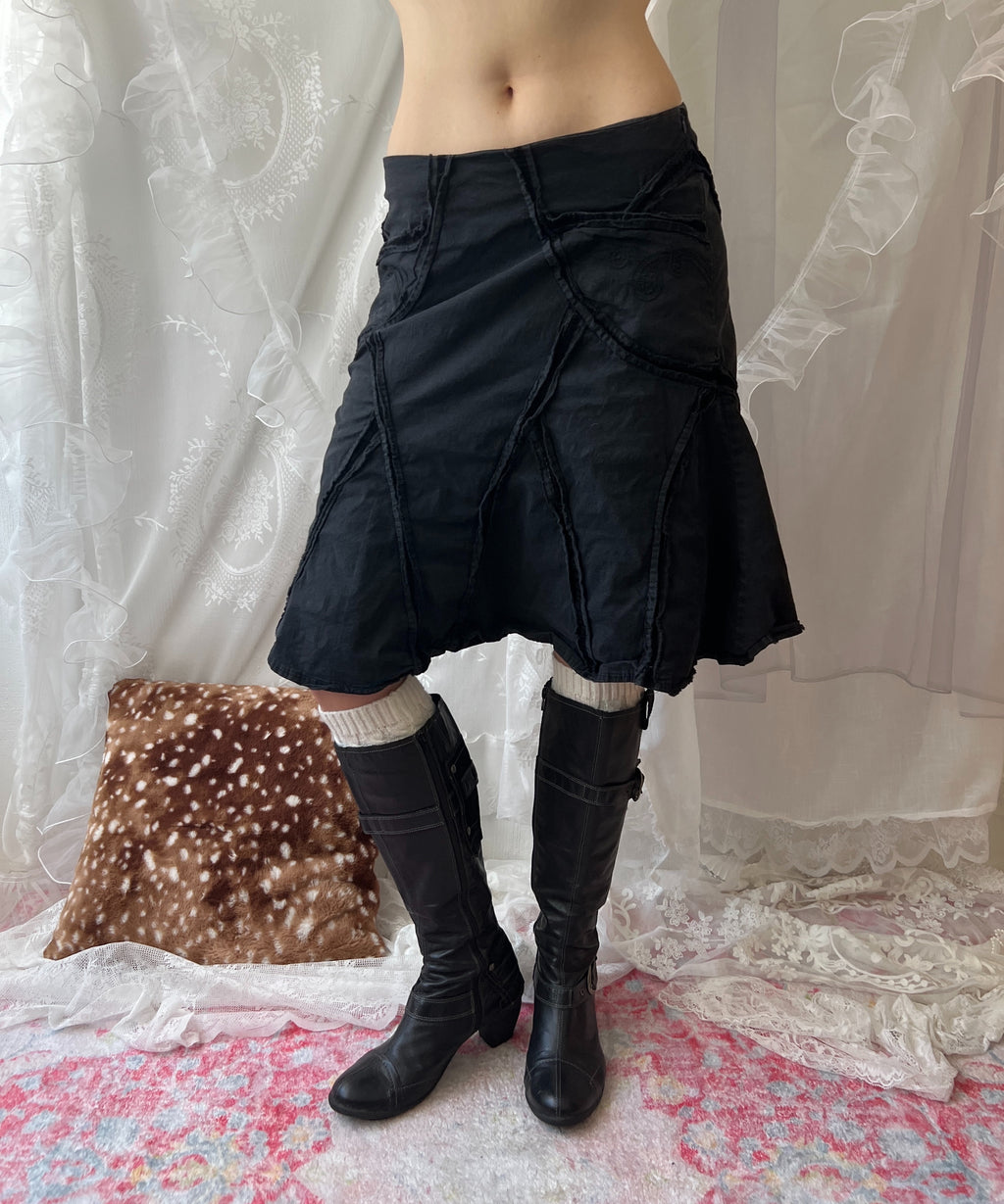 Black cargo skirt with ruffle details