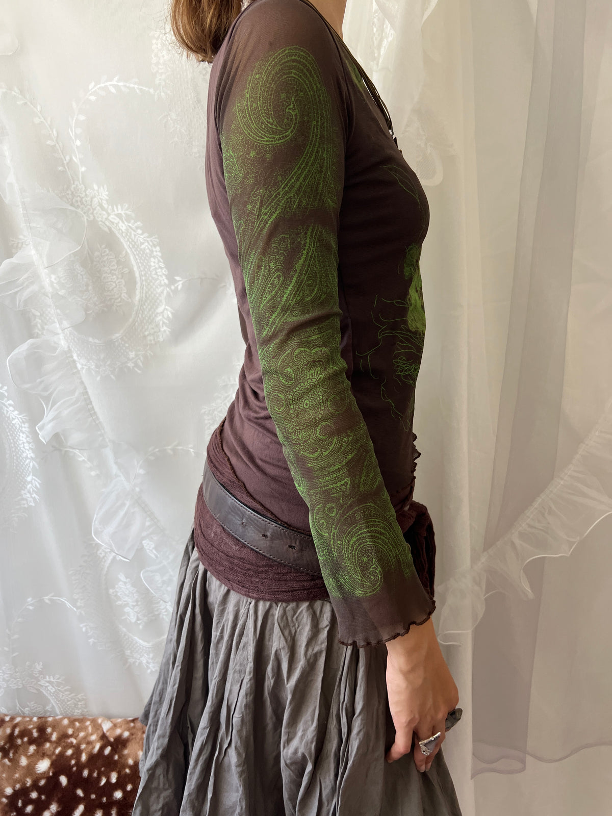 Brown sheer mesh long sleeve top with green floral design