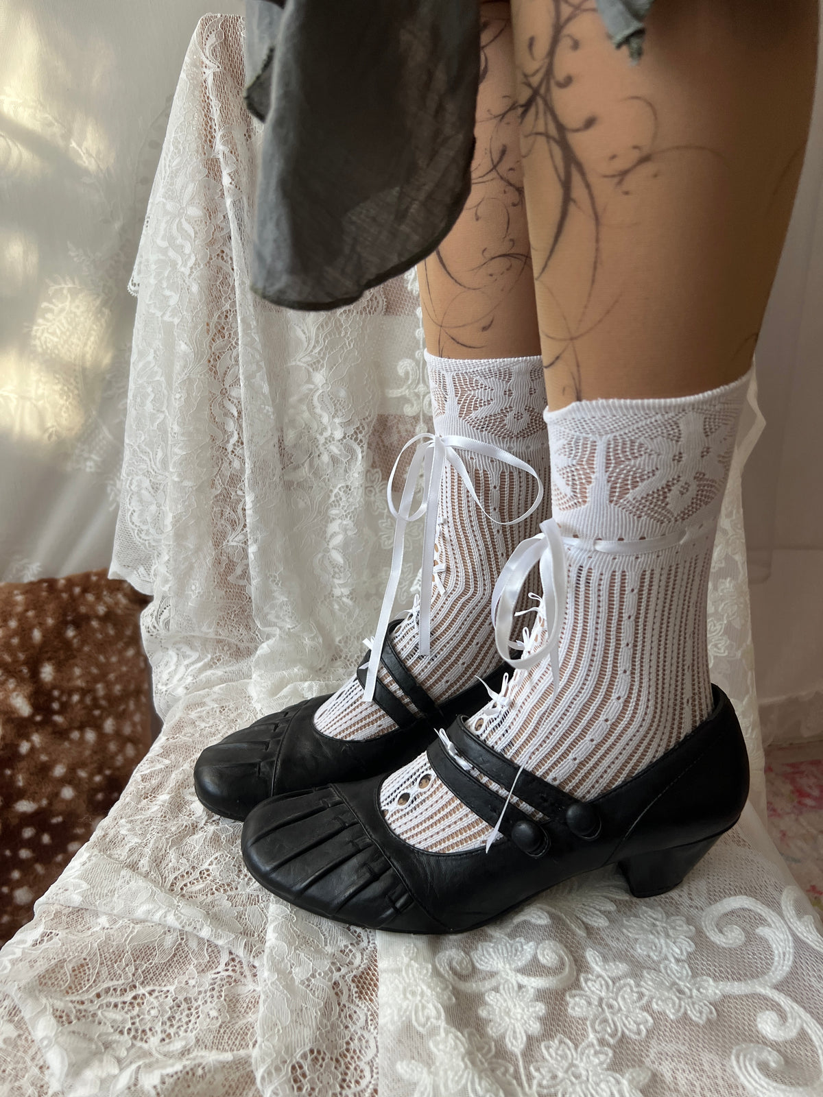Black Mary Jane shoes with button detail