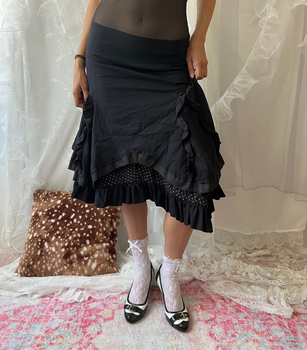 Black layered midi skirt with ruffles and polka dots