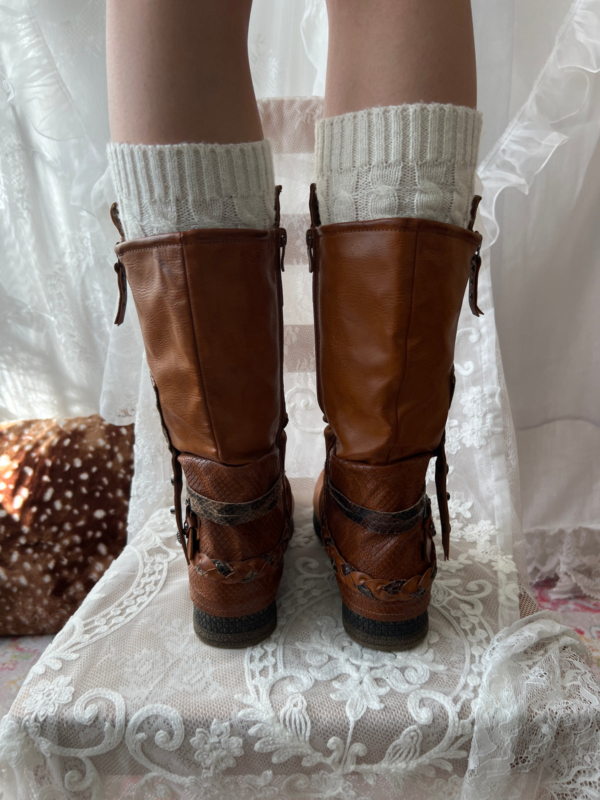 Brown boots with snake skin pattern