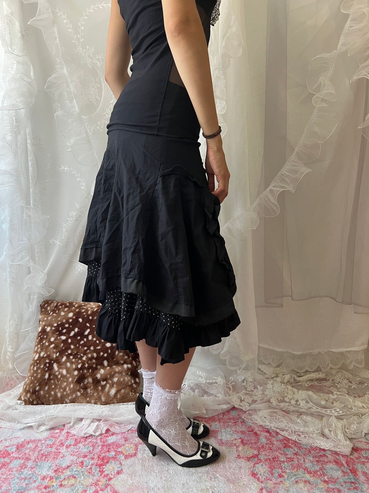 Black layered midi skirt with ruffles and polka dots