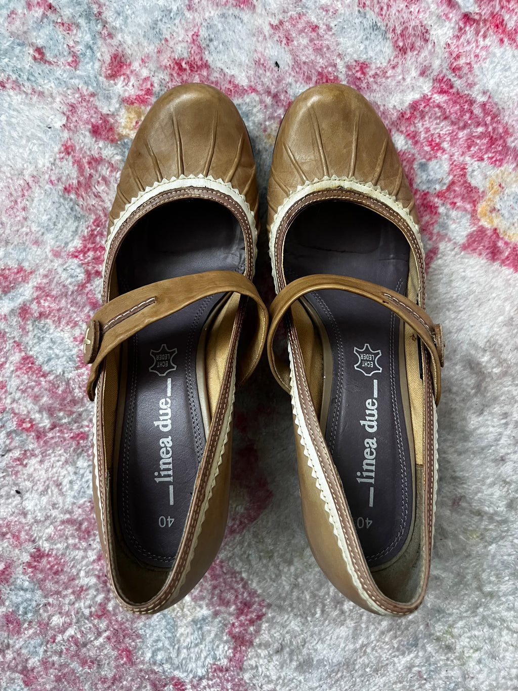 Tan Mary Jane heels with white lace trim and button detail