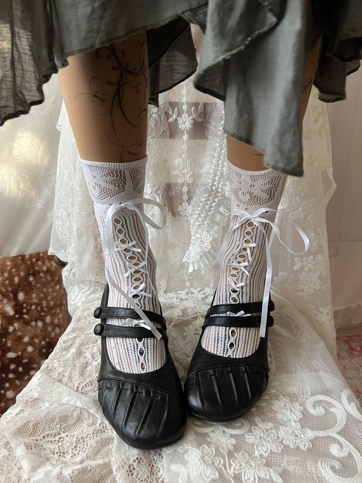 Black Mary Jane shoes with button detail