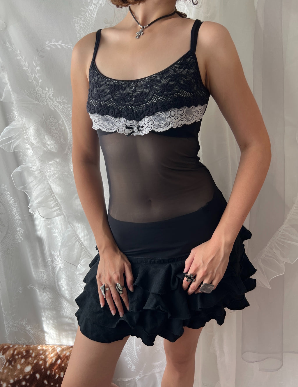Black lace cami top with white lace trim and bow detail