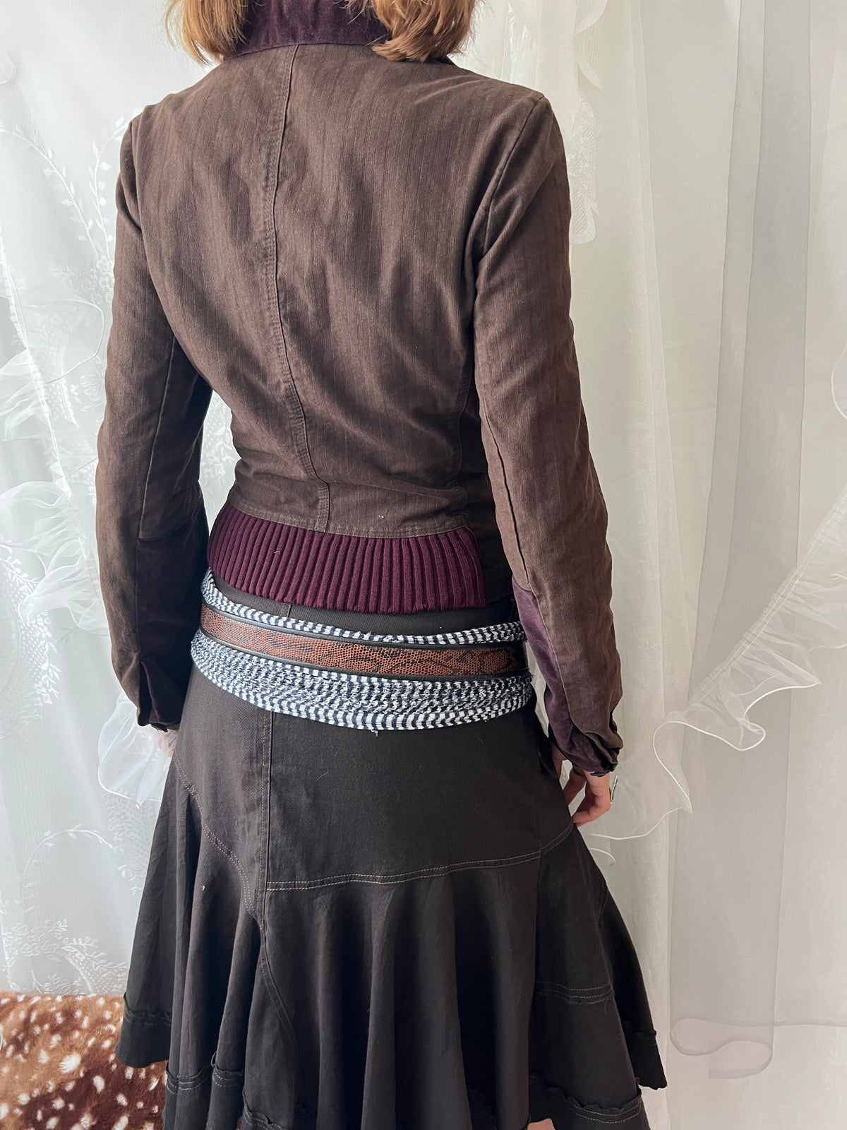 Brown double buttoned asymmetrical avant garde jacket
