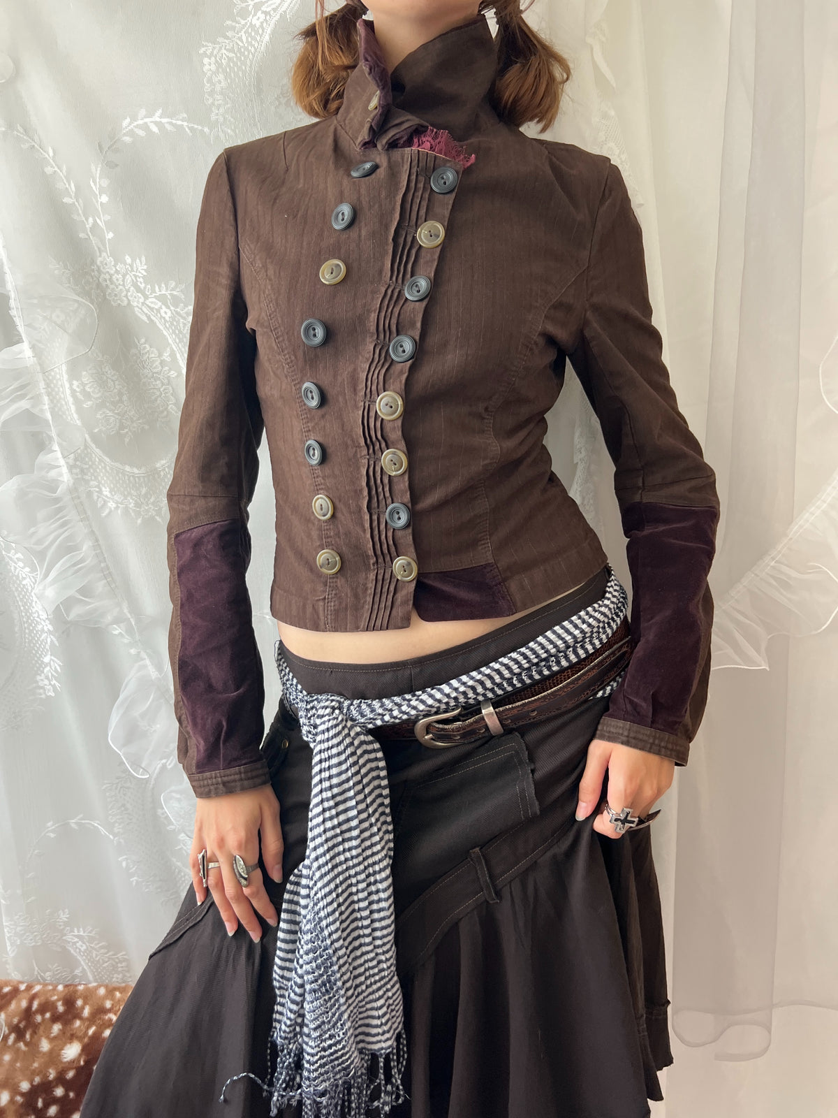Brown double buttoned asymmetrical avant garde jacket