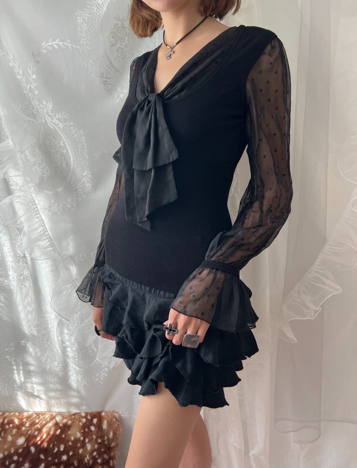 Black sheer polka dot blouse with bow detail