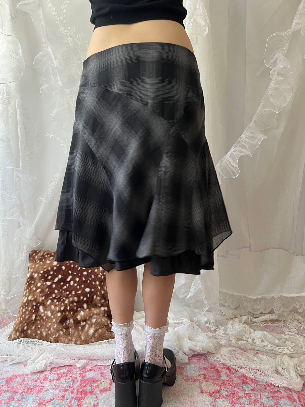 Black & grey plaid midi skirt with ruffles and a flowy hem