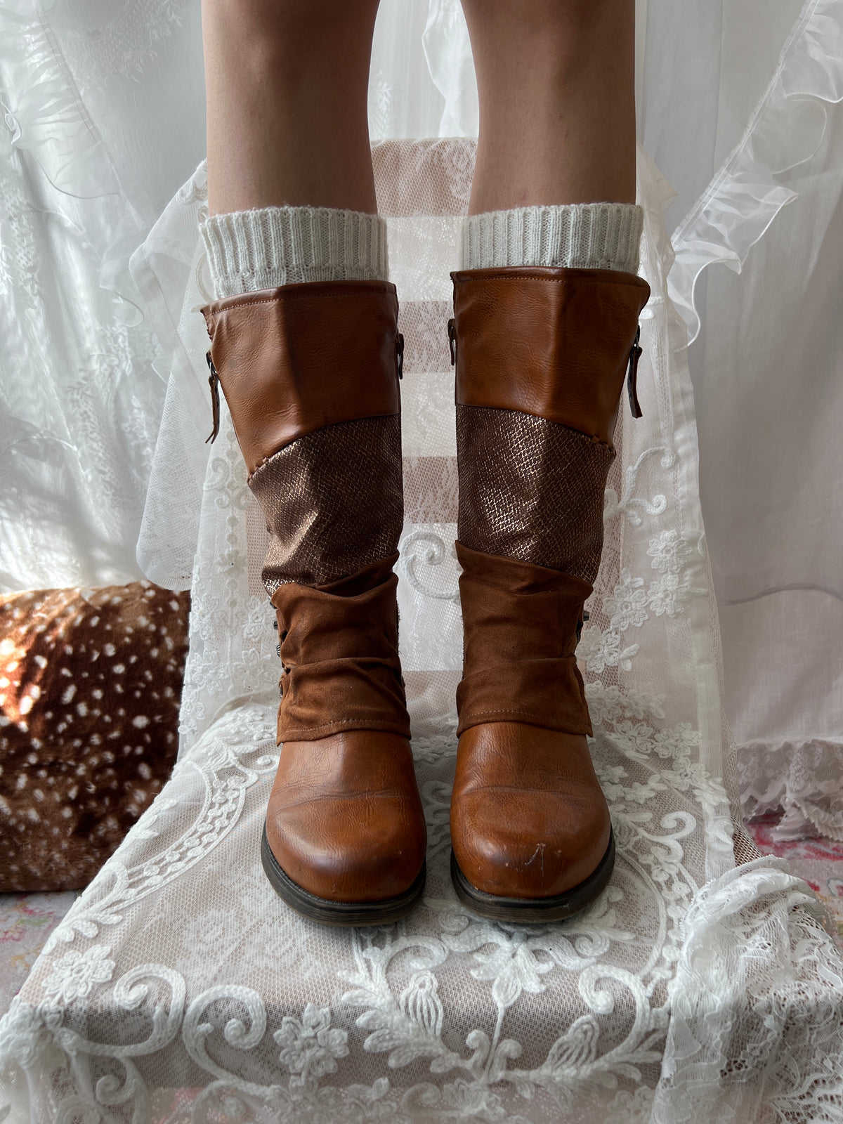 Brown boots with snake skin pattern
