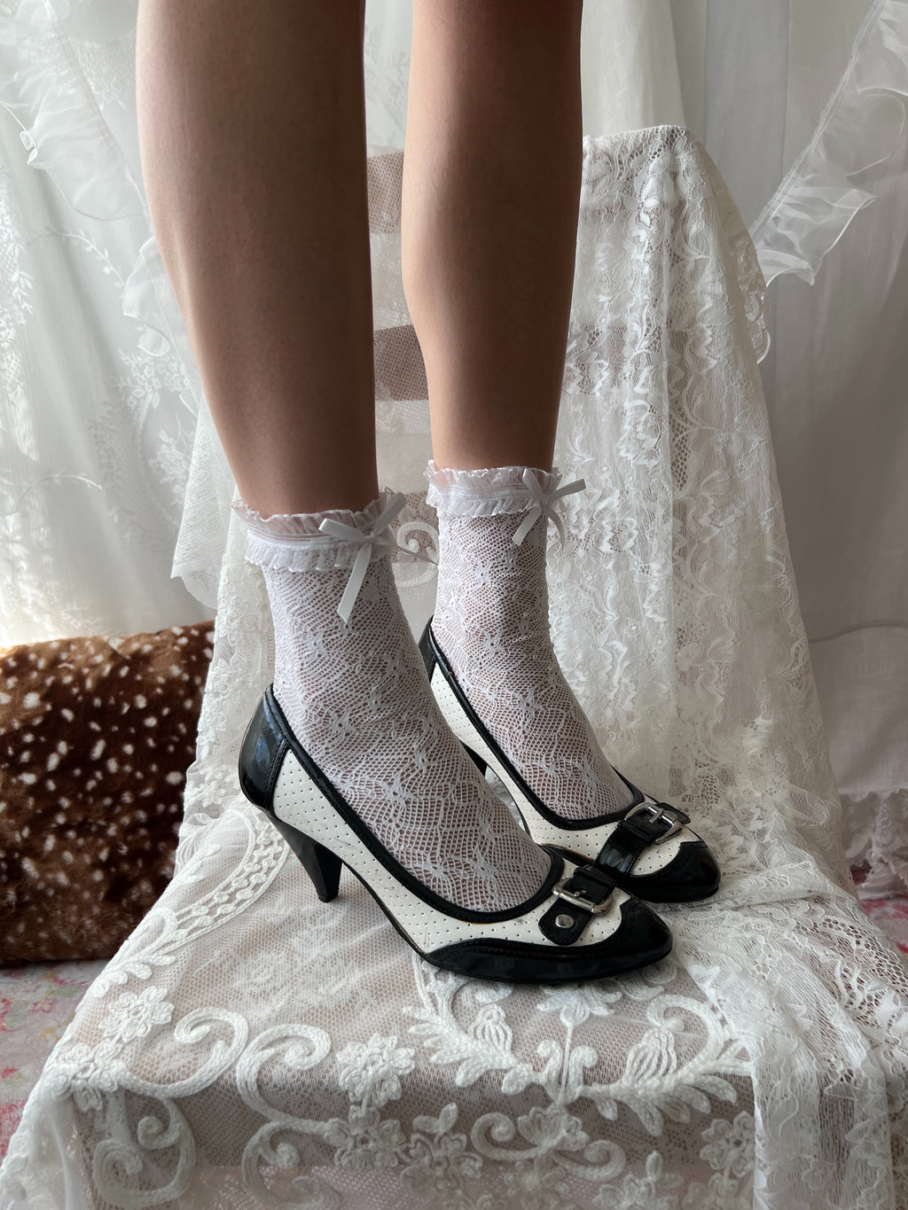 Black and white polka dot heels with buckle detail