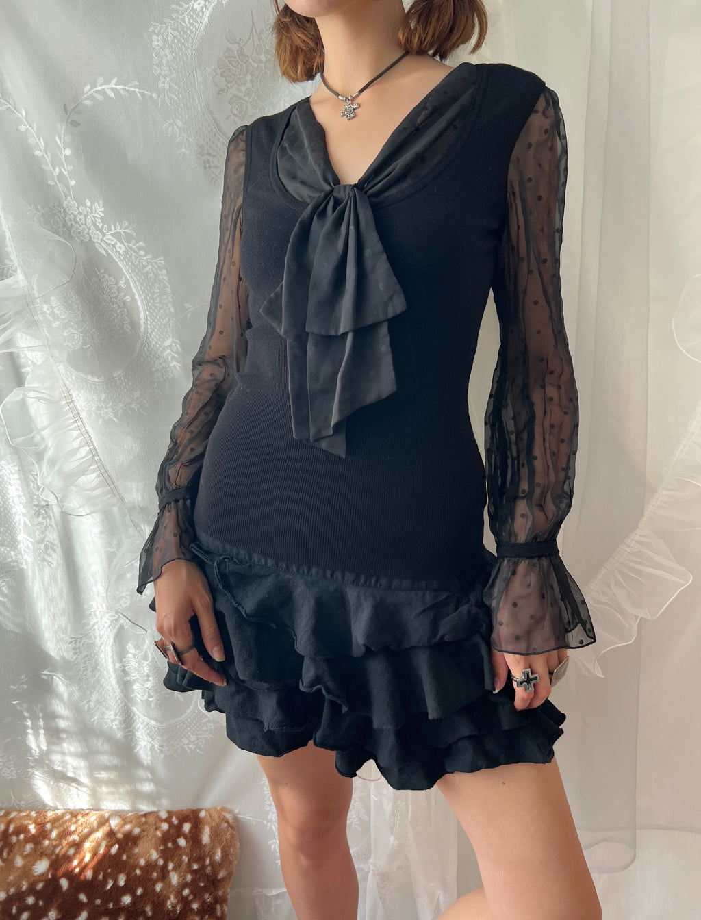 Black sheer polka dot blouse with bow detail