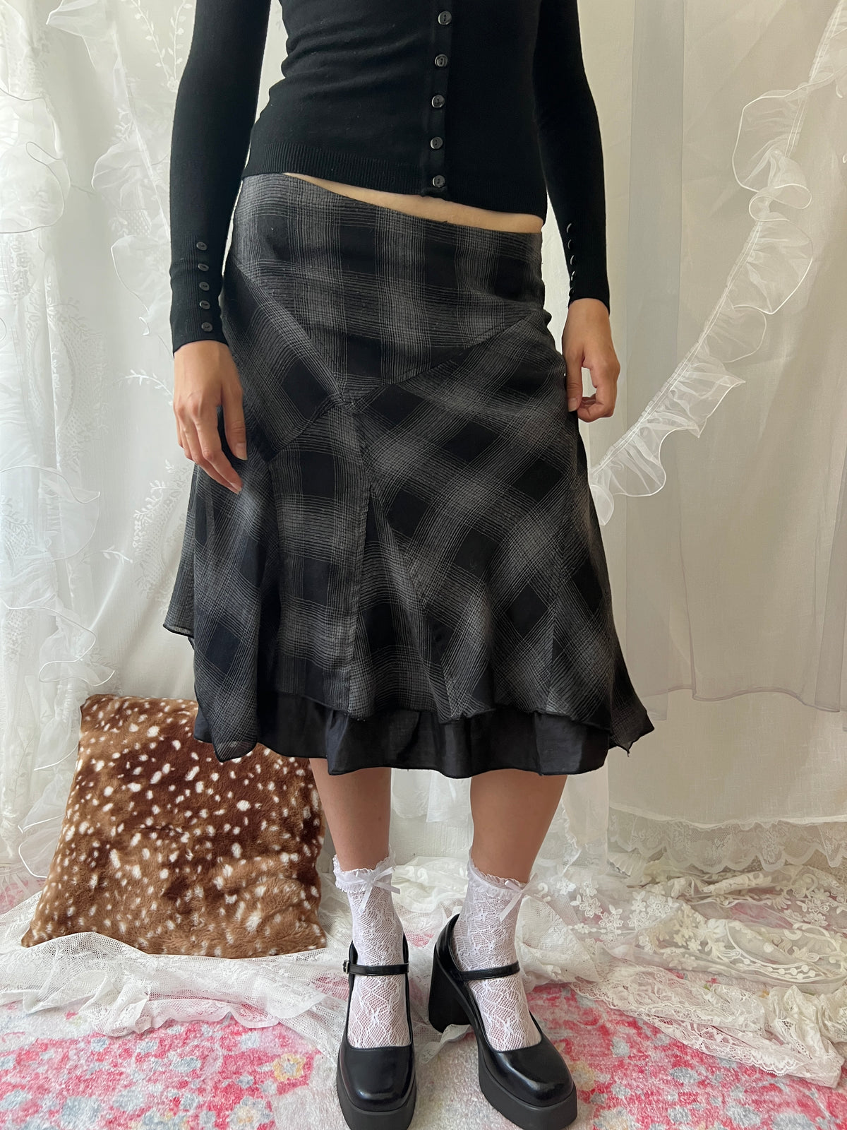 Black & grey plaid midi skirt with ruffles and a flowy hem