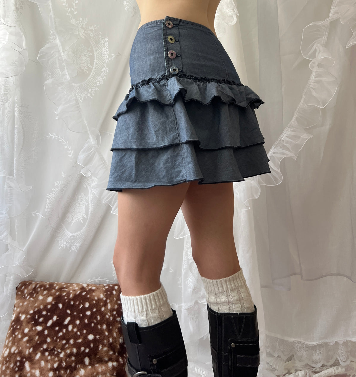 Blue ruffle layered mini skirt with buttons on both sides