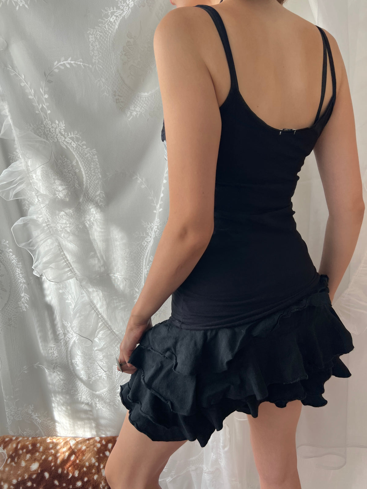 Black lace cami top with white lace trim and bow detail