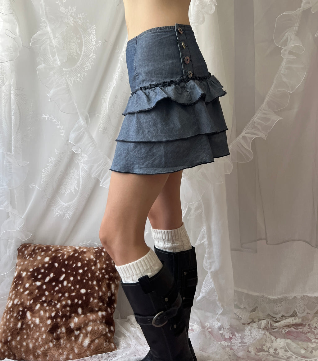 Blue ruffle layered mini skirt with buttons on both sides
