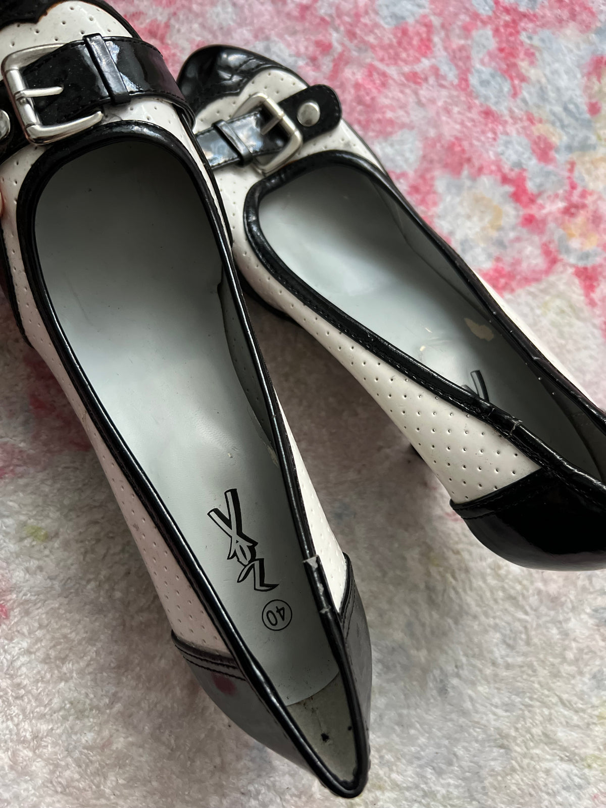 Black and white polka dot heels with buckle detail