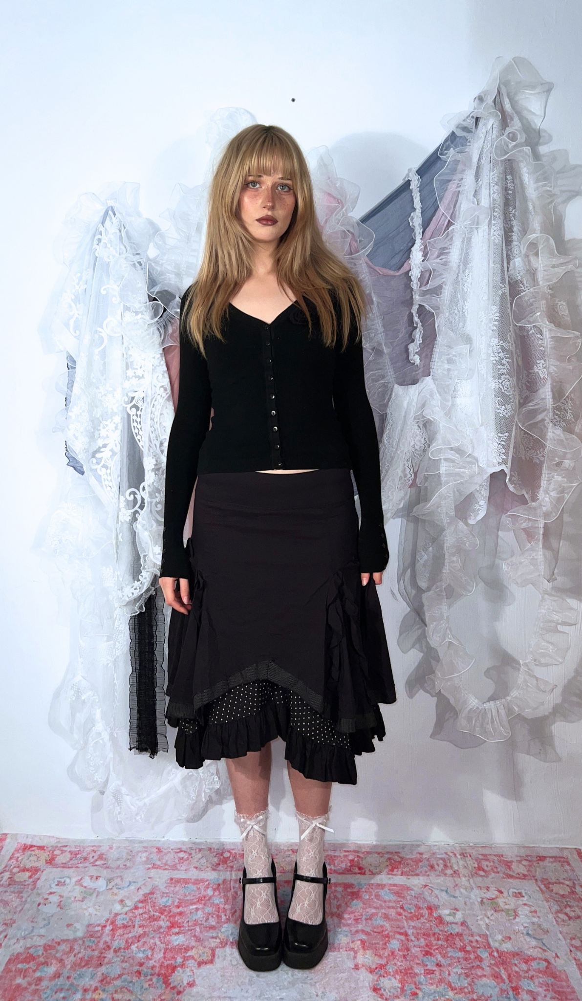 BLACK POLKA-DOT RUFFLED MIDI SKIRT