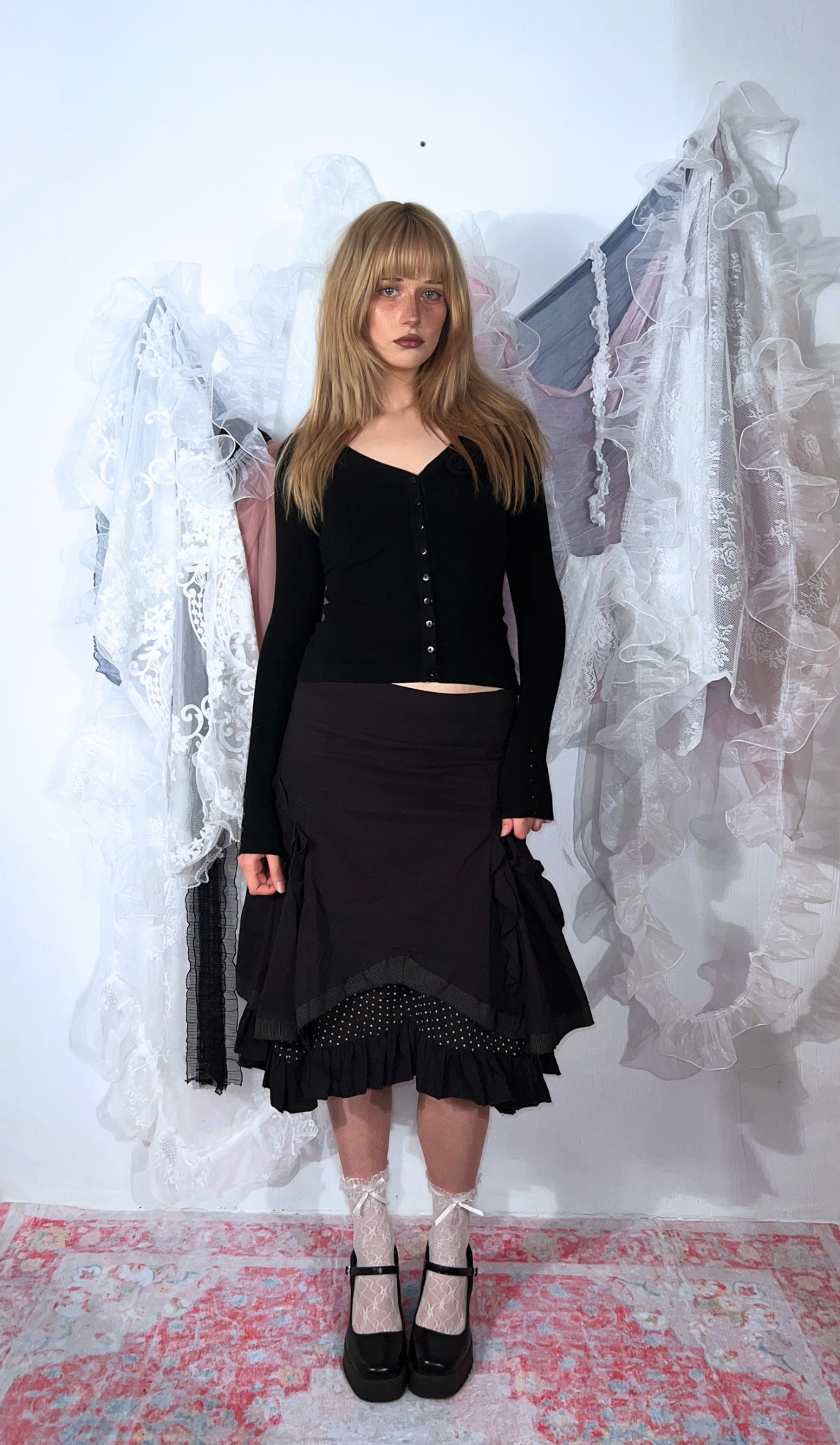 BLACK POLKA-DOT RUFFLED MIDI SKIRT