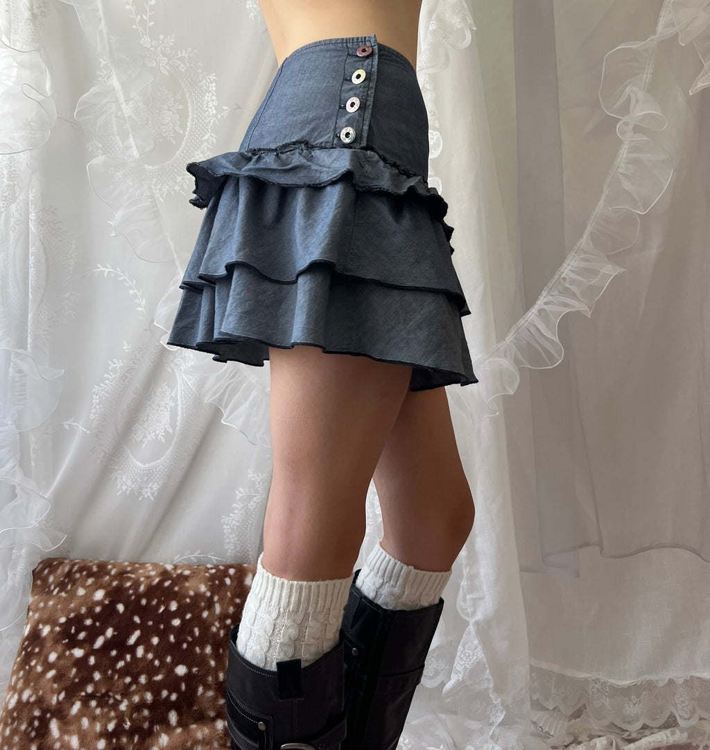 Blue ruffle layered mini skirt with buttons on both sides