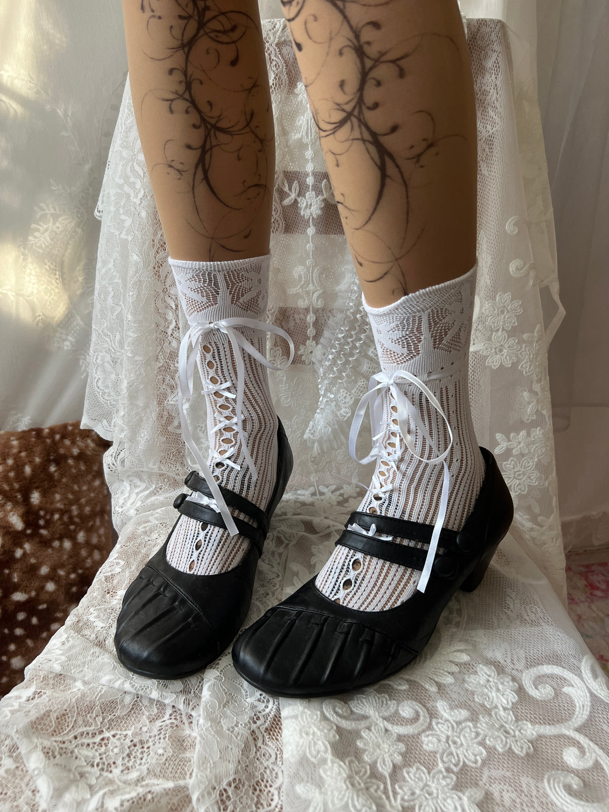 Black Mary Jane shoes with button detail