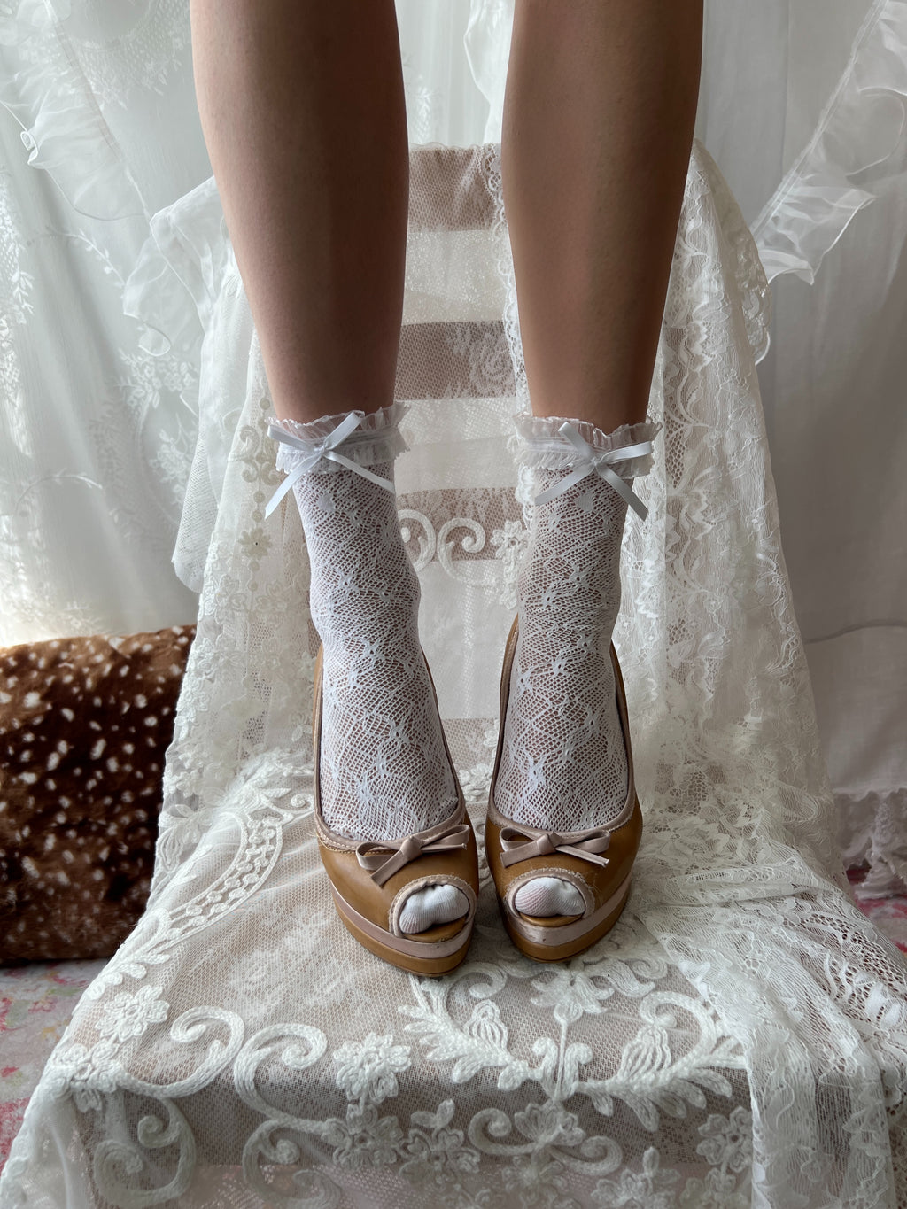 Tan peep toe heels with bow