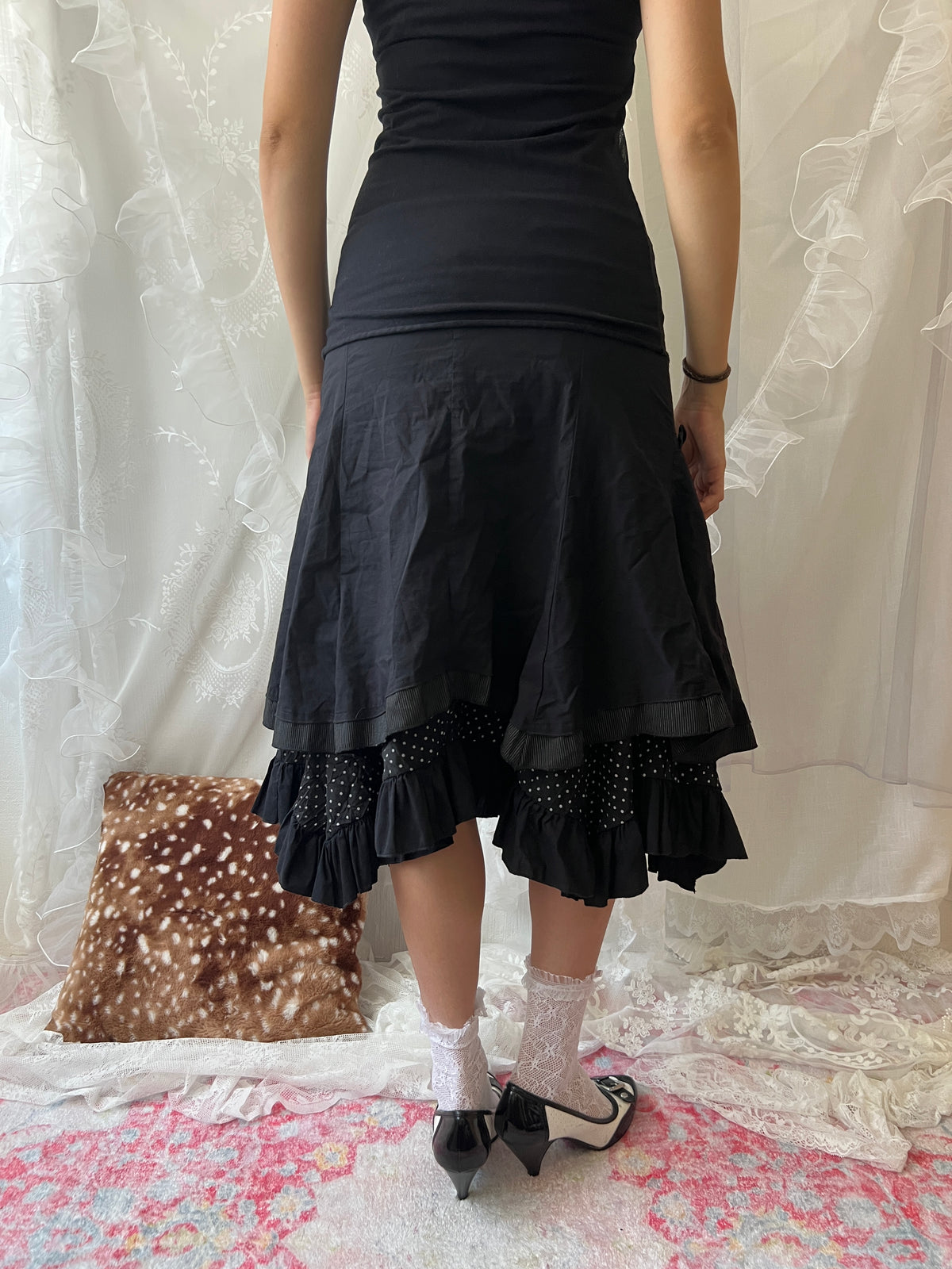 Black layered midi skirt with ruffles and polka dots