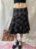 Black & grey plaid midi skirt with ruffles and a flowy hem