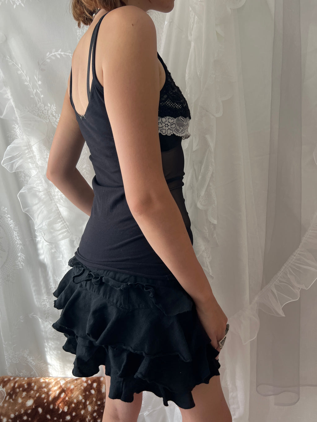 Black lace cami top with white lace trim and bow detail