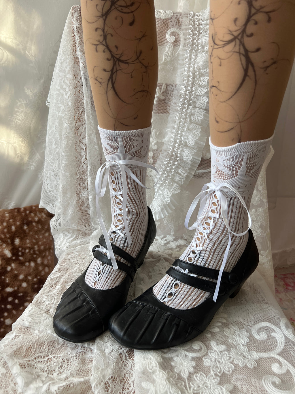 Black Mary Jane shoes with button detail