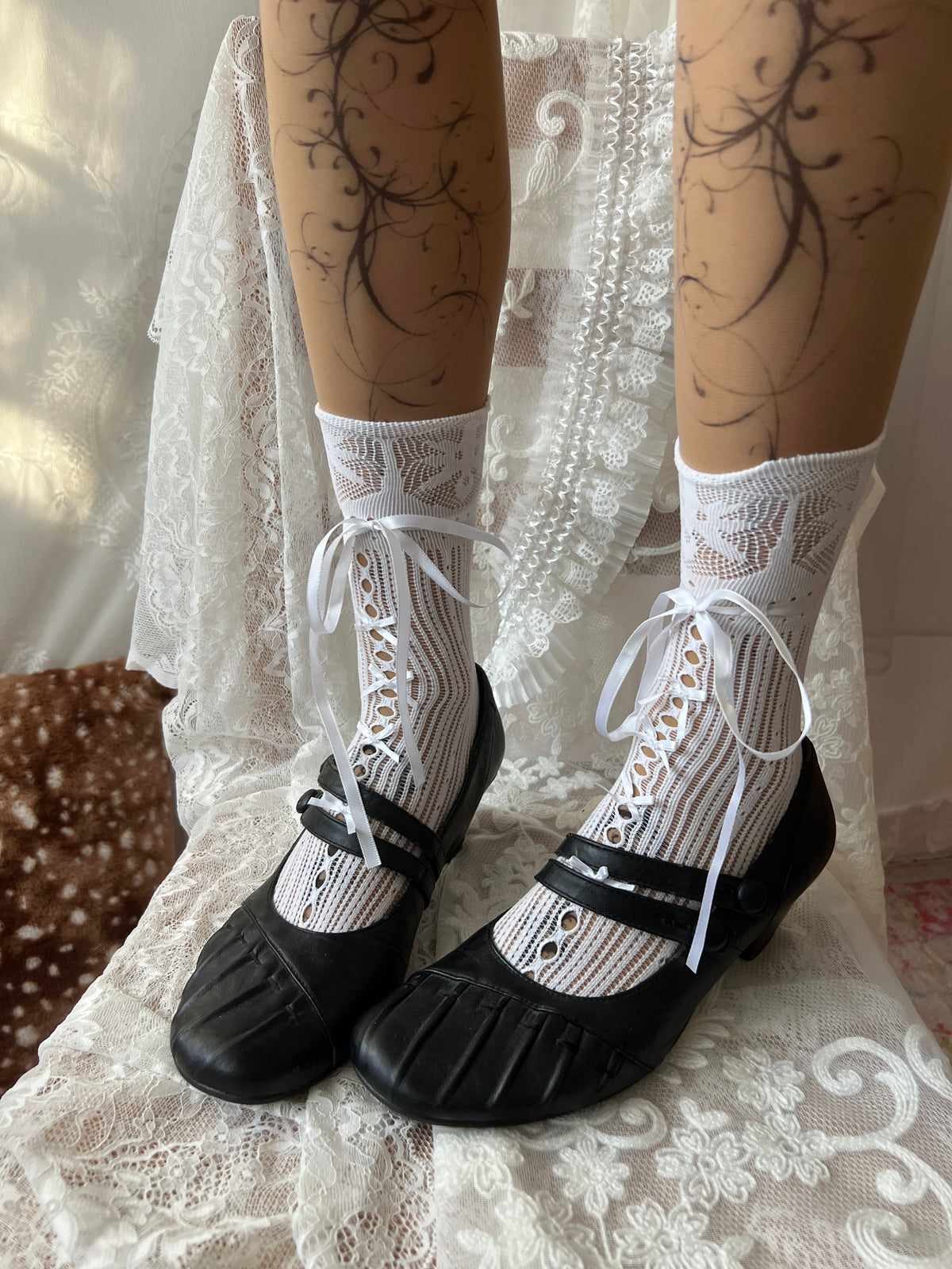 Black Mary Jane shoes with button detail