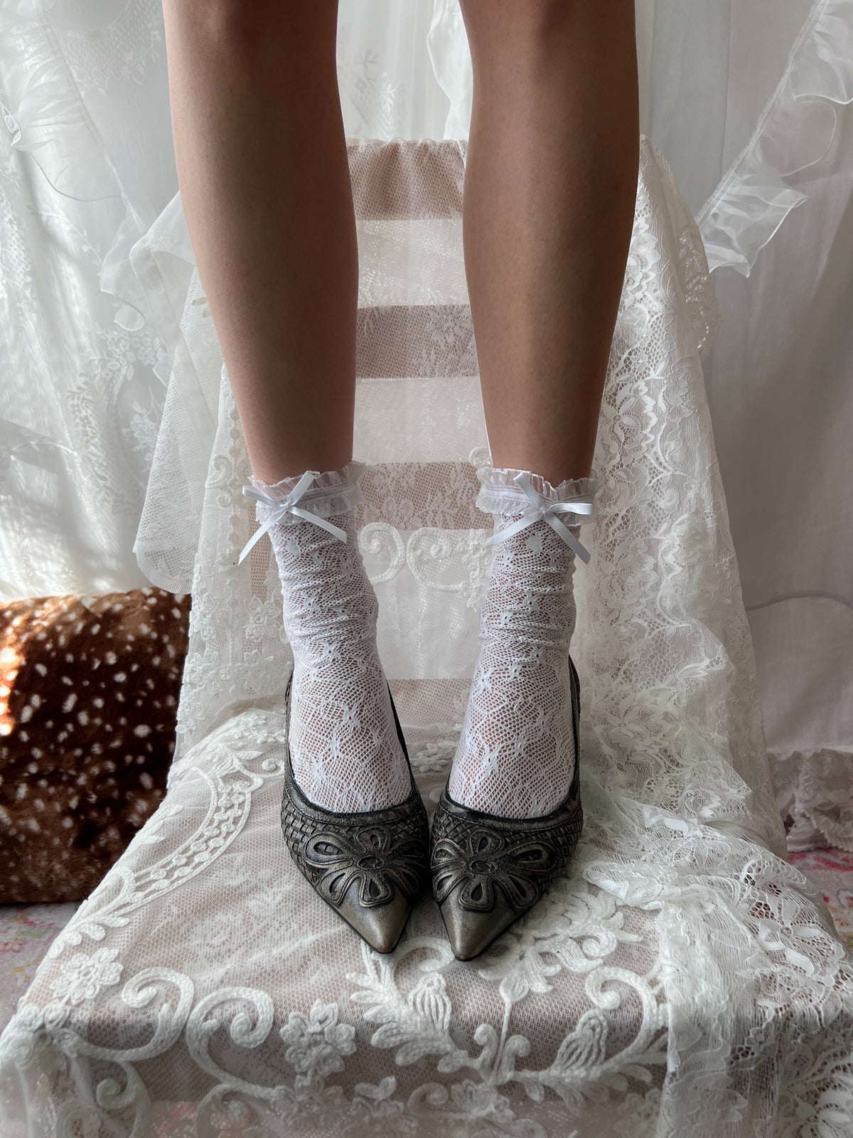 Grey snake skin kitten heels with flower detail