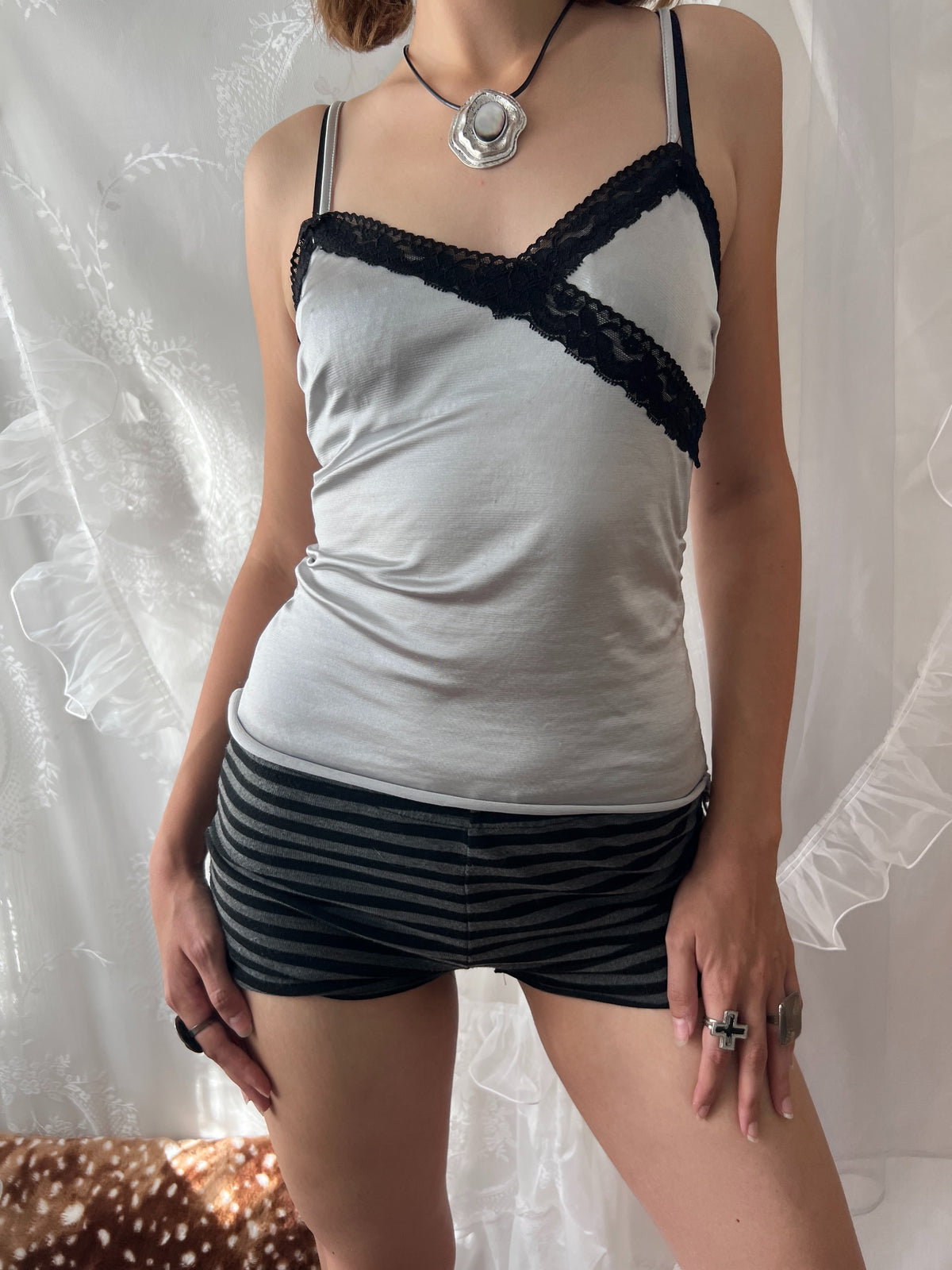 Black lace silver cami top with adjustable straps and tie detail