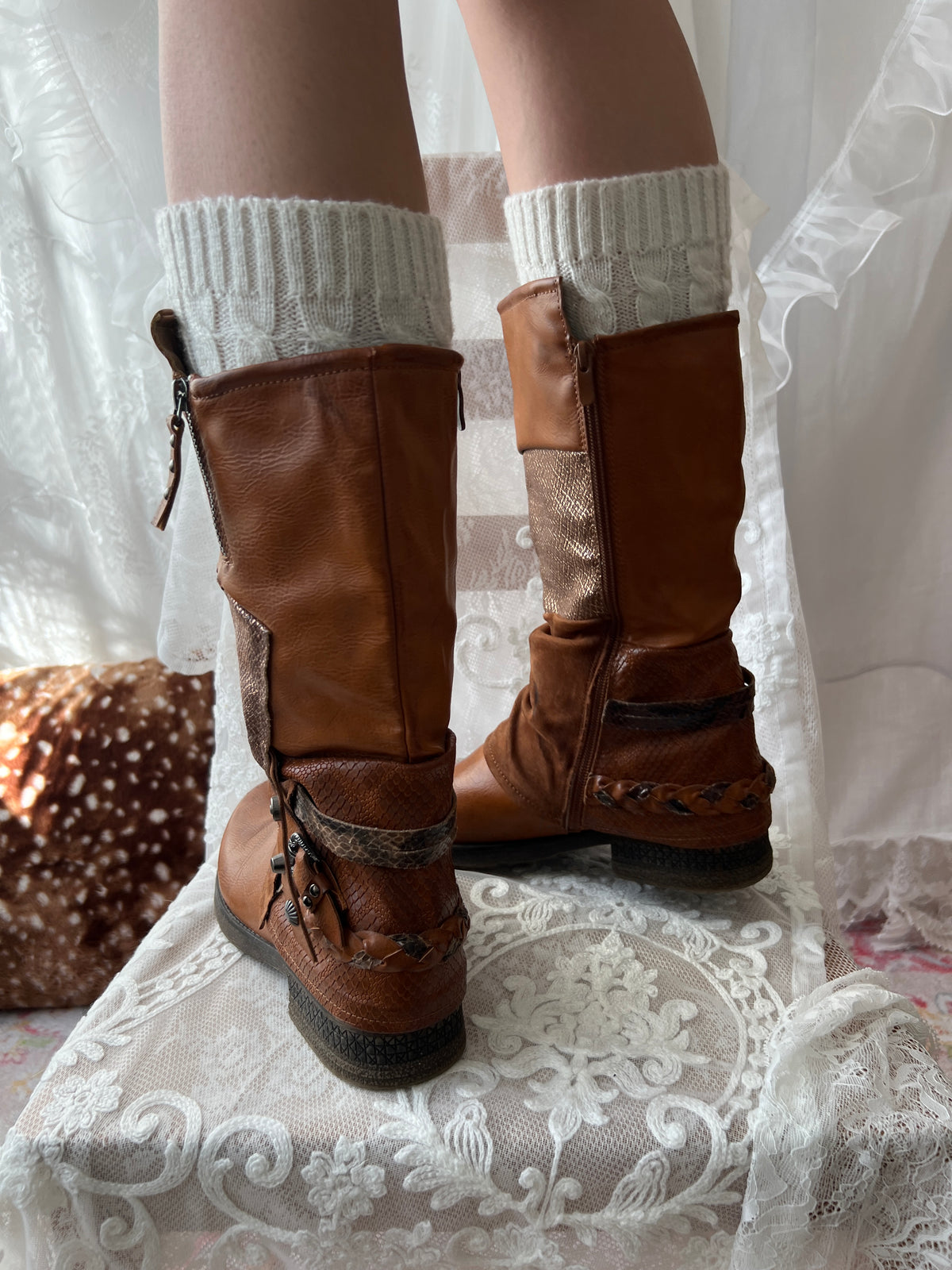 Brown boots with snake skin pattern