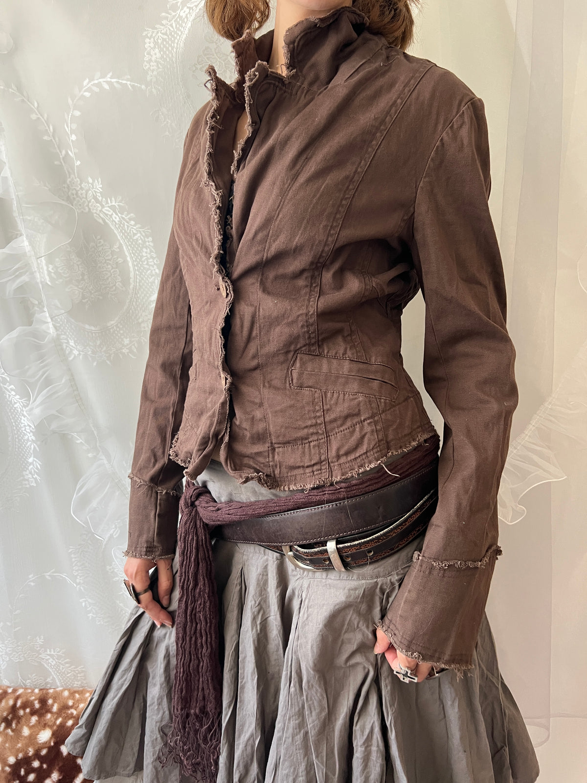 Brown cropped jacket with frayed hem and button details