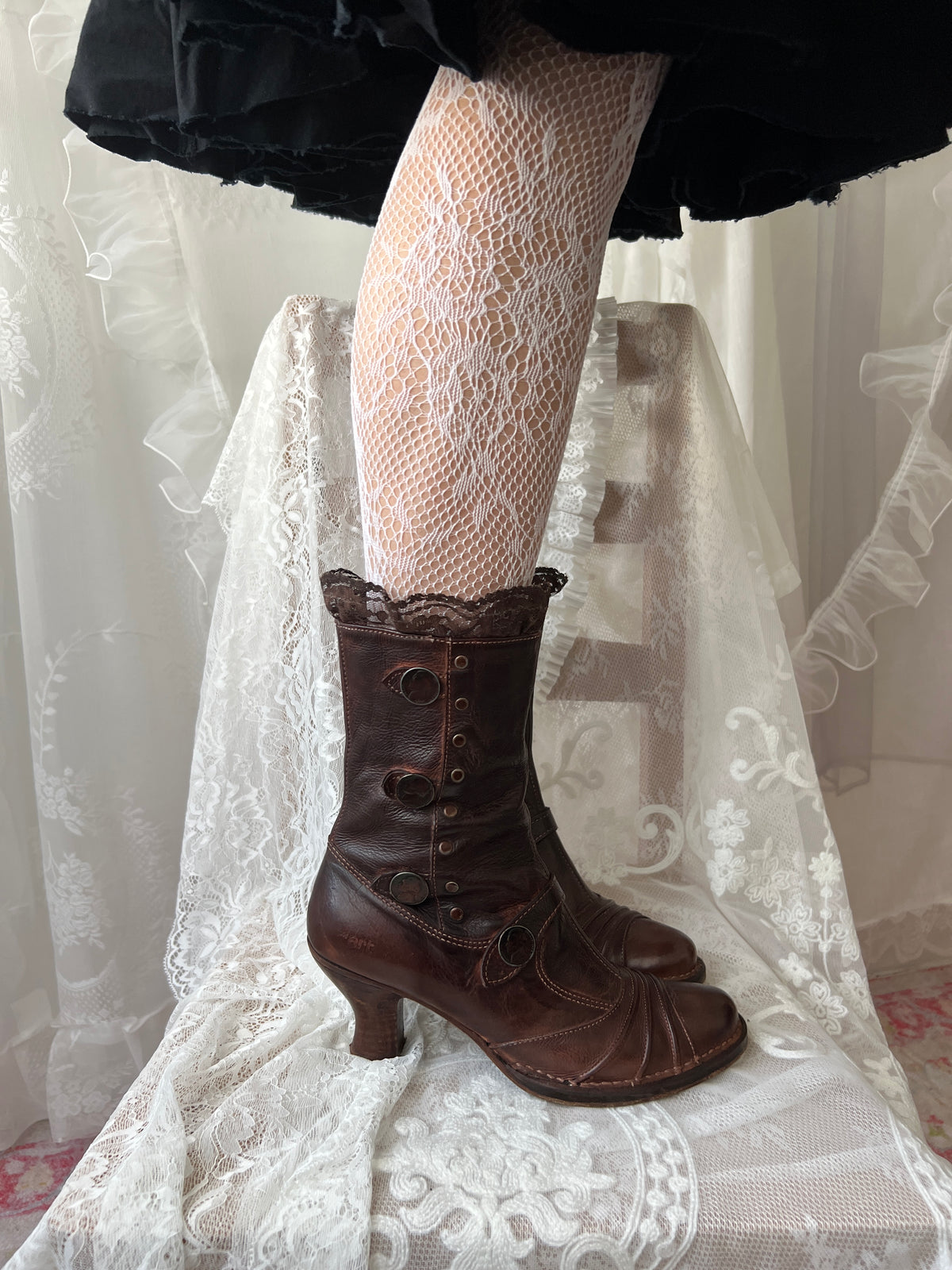 Brown Art leather lace up boots with a gothic vibe