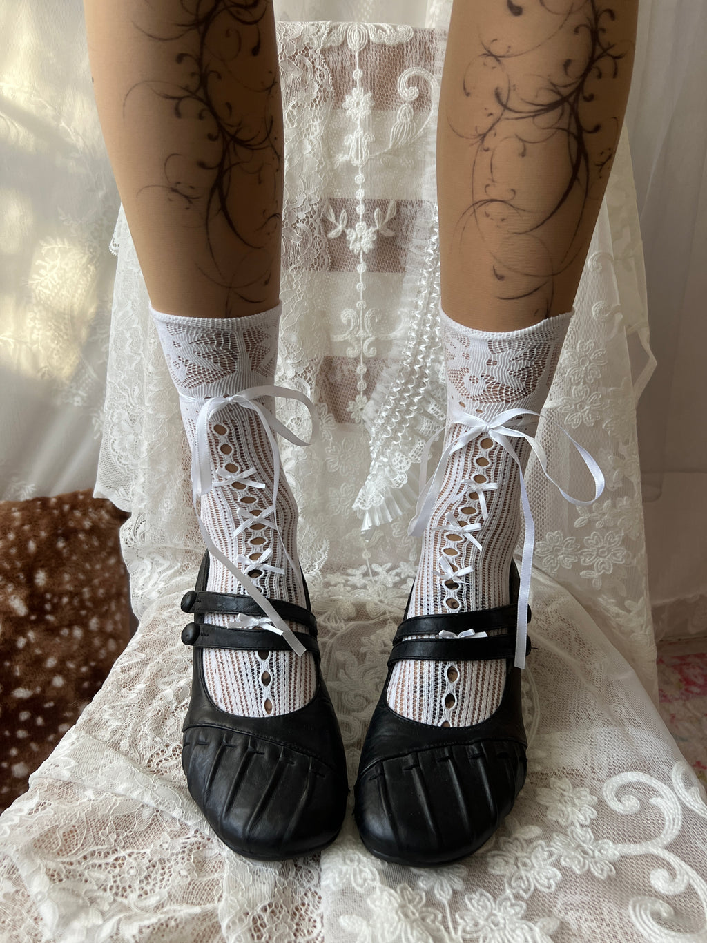 Black Mary Jane shoes with button detail