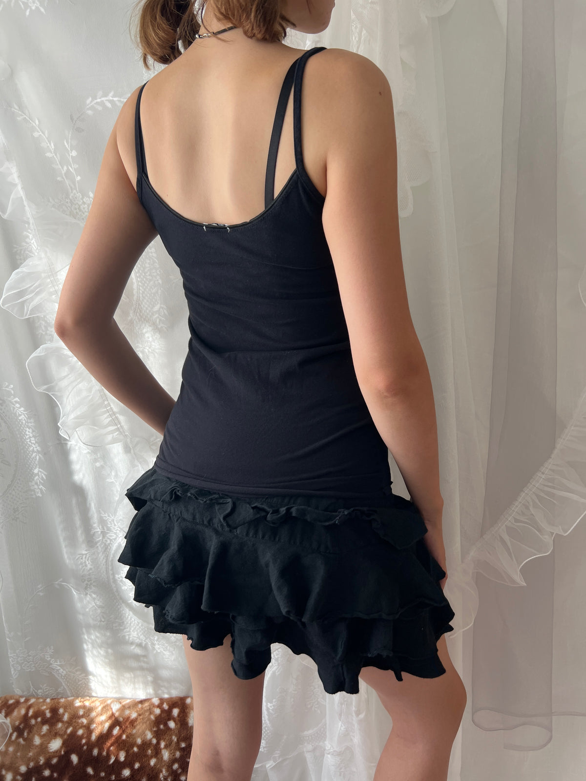 Black lace cami top with white lace trim and bow detail