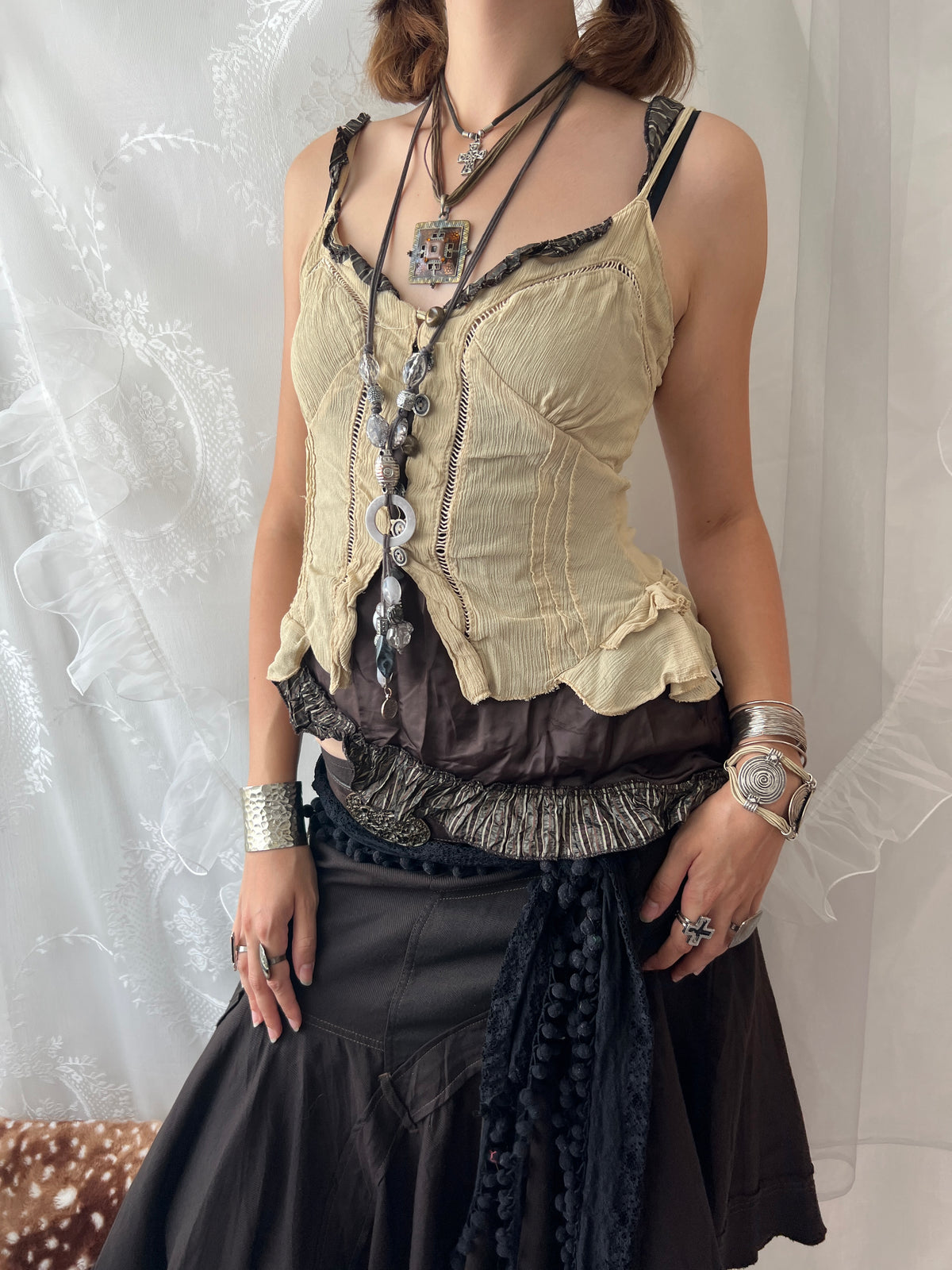 Cream & brown layered asymmetrical corset top with ruffles and lace details