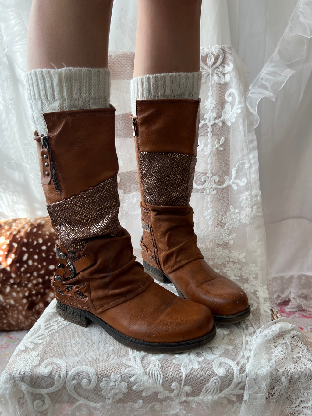 Brown boots with snake skin pattern